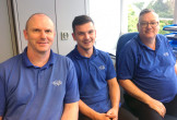 Daniel Pinder (centre) graduates from University of Greenwhich